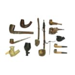 A collection of twelve African pipes,