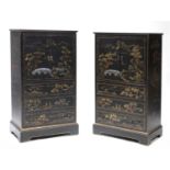 A pair of chinoiserie ebonised, painted and gilt cabinets,