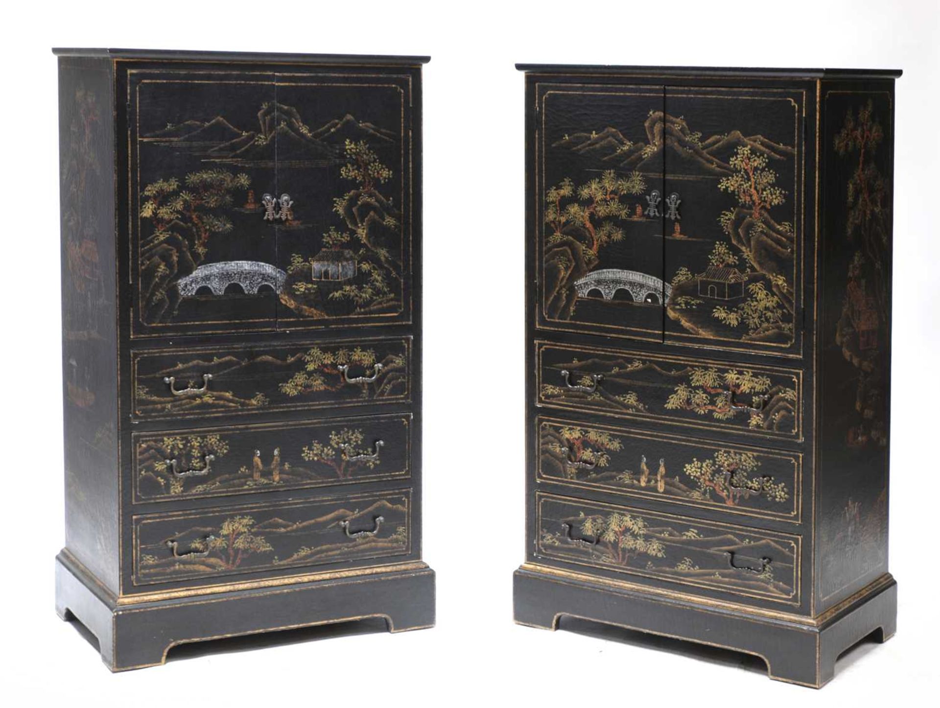 A pair of chinoiserie ebonised, painted and gilt cabinets,