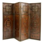 An oak and embossed leather four fold screen,