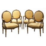 A set of four French giltwood salon chairs,
