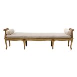 A large French giltwood window seat,