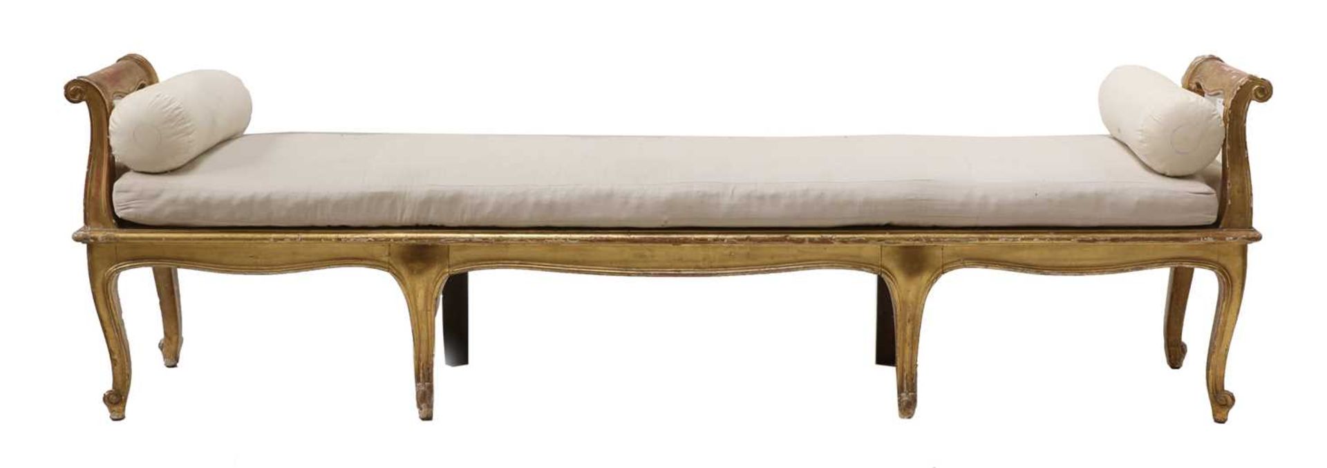 A large French giltwood window seat,