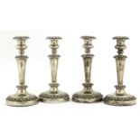 A set of four William IV silver candlesticks,
