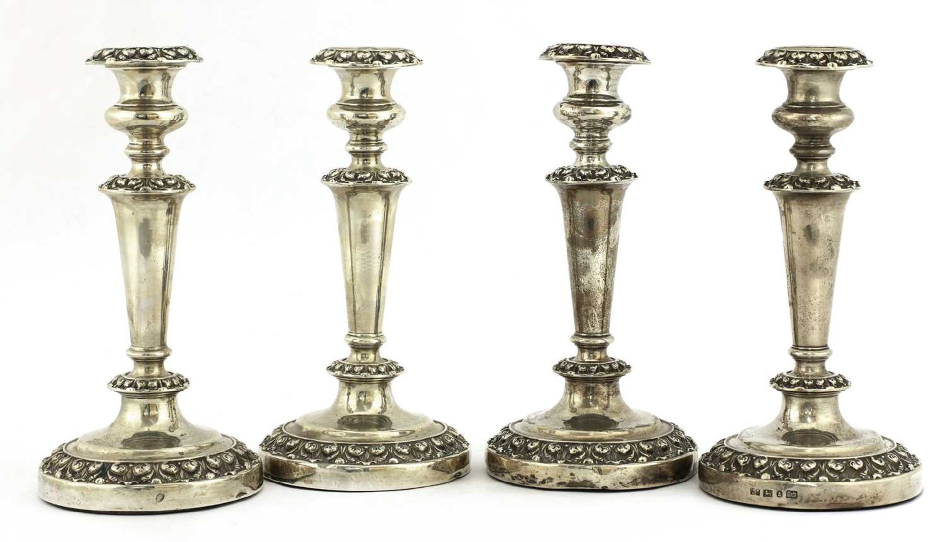 A set of four William IV silver candlesticks,