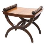 A Regency oak stool in the manner of George Bullock