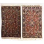 A pair of hand-knotted Persian rugs,