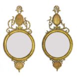 A pair of neoclassical-style giltwood mirrors,
