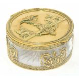 A French Empire gilt metal mounted circular glass table box,