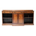 A large late Victorian oak breakfront bookcase,