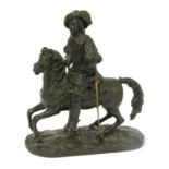 A bronze figure of a cavalier on horseback,