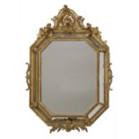 A carved giltwood framed lozenge-shaped wall mirror,