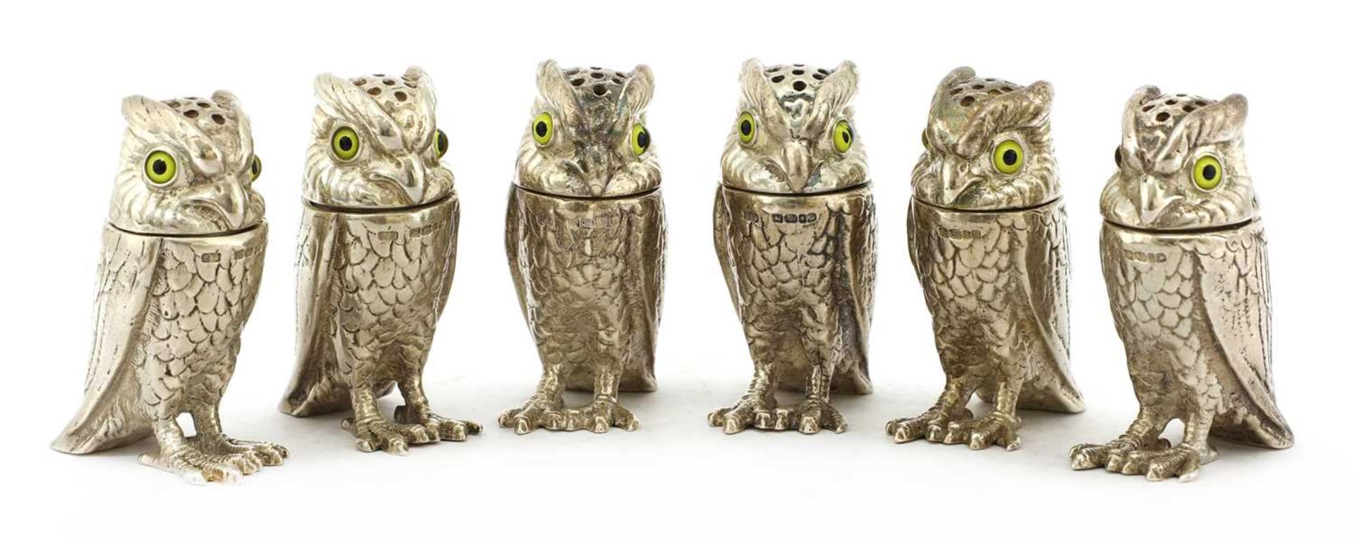 A set of six modern cast silver owl pepperettes,