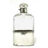 An Edwardian cut-glass and silver-mounted hip flask,