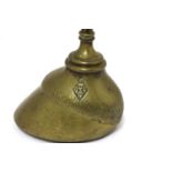 A Victorian brass doorstop,