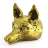 A brass doorstop,