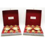 Two cased sets of boxes Limoges coffee cans and saucers,