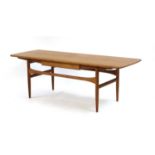 A teak Scandart coffee table,