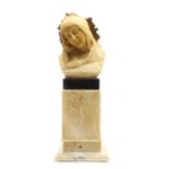 An alabaster bust of the Virgin Mary,