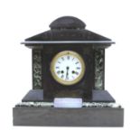 A Victorian slate mantel clock of architectural design,