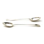 Two English silver basting spoons,