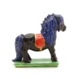 A Nymphenburg porcelain model of a Shetland Pony,