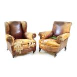 A brown leather club armchair,