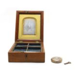 An 1840s gentleman's watch and jewellery case mahogany with velvet partitioned tray,