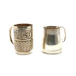 A George V silver mug of milk can shape and reeded border by Mappin & Webb,