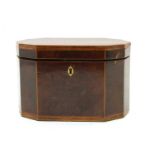 An 18th century yew wood tea caddy,