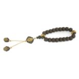 A Chinese wooden bead rosary,