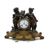 A 19th century bronzed and gilt spelter mantel clock,