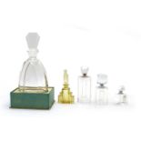 A collection of Art Deco style glass perfume bottles