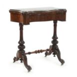 A Victorian burr walnut Serpentine fronted fold over top games table,