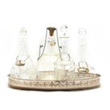 A collection of four cut glass decanters,
