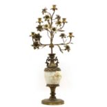 A gilt metal and alabaster candlestick vase,