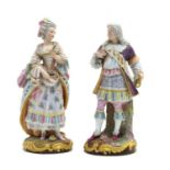 A pair of 19th century Continental porcelain figures,