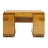 An Art Deco bird's-eye maple and walnut inlaid desk,