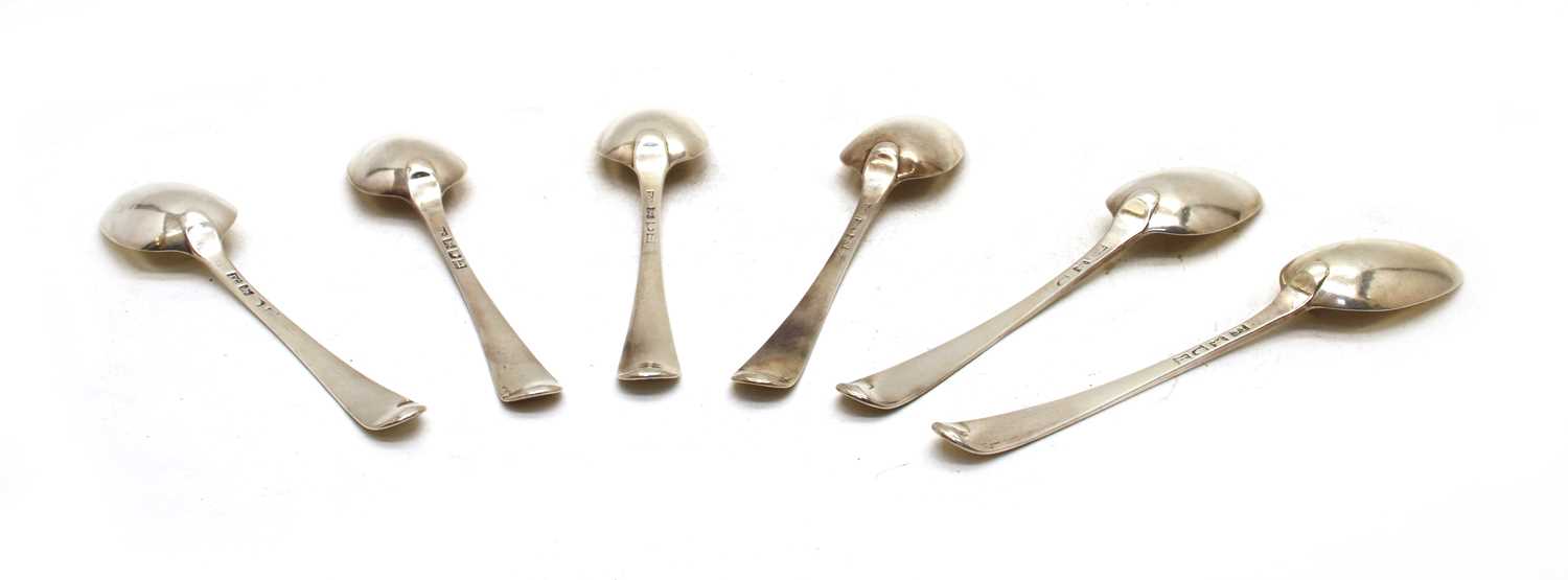 A set of six George III bright cut silver table spoons,