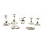 Silver items comprising two pairs of dwarf candlesticks,