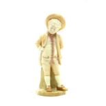 A Royal Worcester figure of a young boy