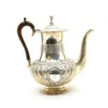 A Victorian silver coffee pot,