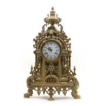 A large brass mantel clock