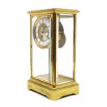 A French four glass brass mantel clock,
