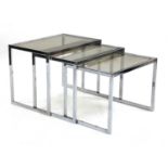 A nest of three chrome tables,