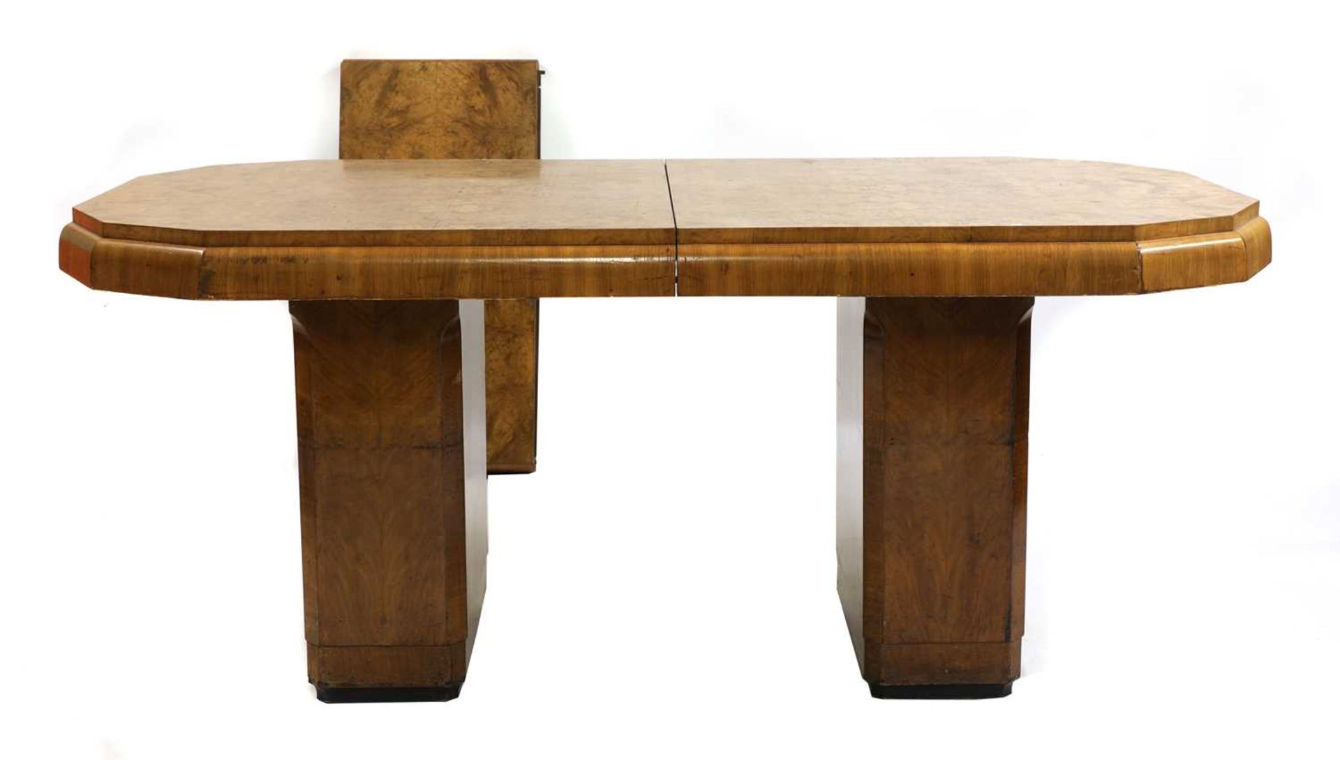 An Art Deco burr walnut extending dining table,