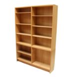 A Danish light oak two-part bookcase,