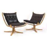 A pair of Falcon chairs,