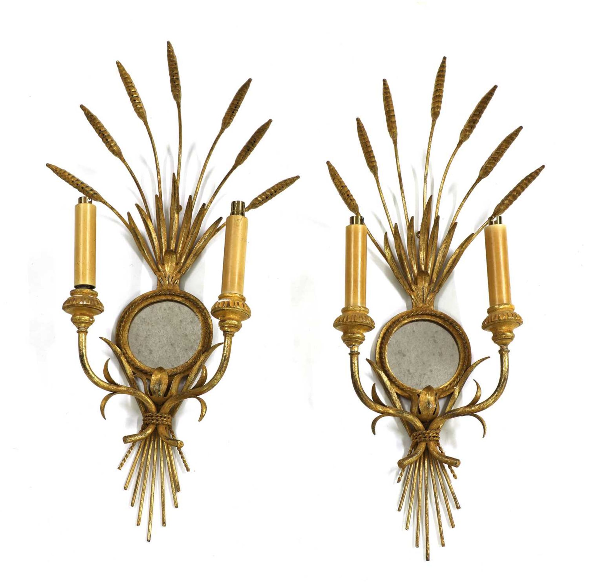 A pair of twin-branch wall lights,