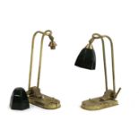 A pair of Art Deco articulated brass desk lamps,